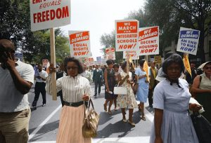 Civil rights marchers demand decent housing in photo shared by Unseen Histories